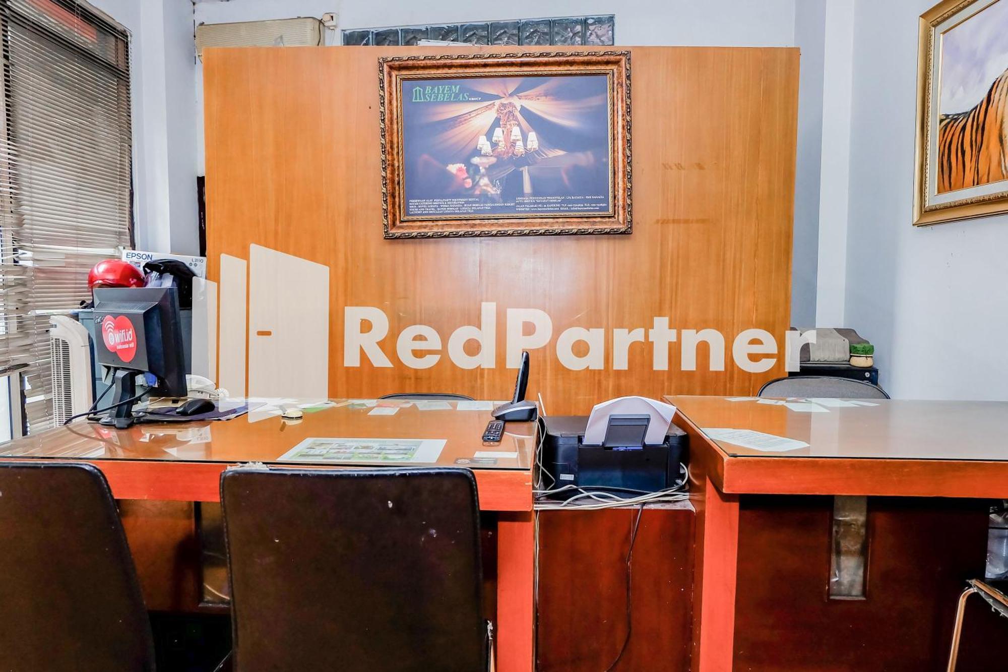 Oyo 2675 Sebelas Syariah Hotel 2*